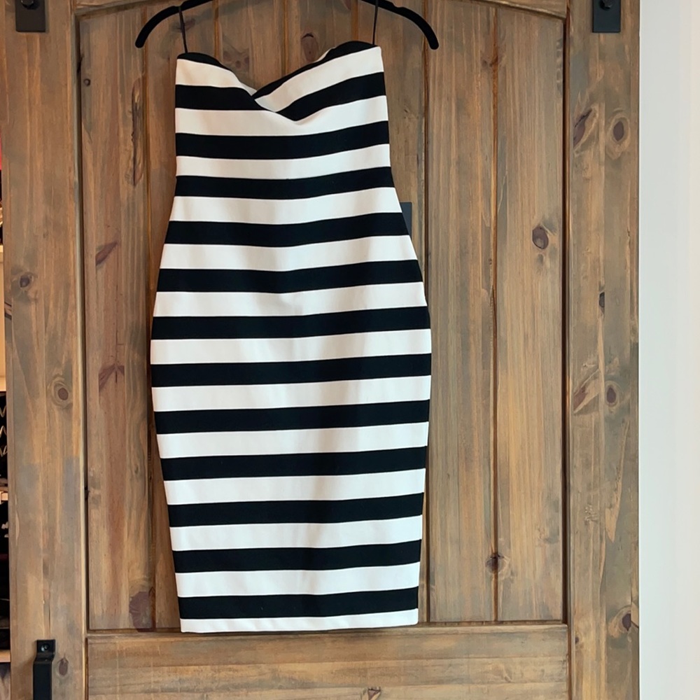 T- length dress. Never worn with tags
